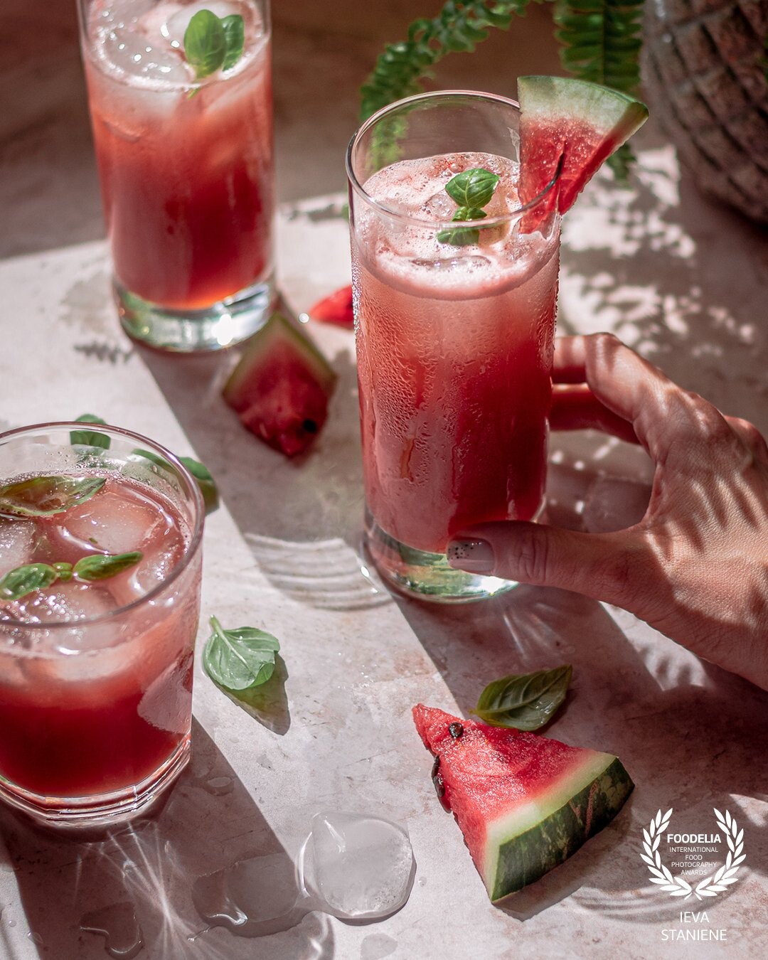 This shot was all about bringing those summer vibes with color contrast, exciting highlights and shadows, melting ice and summery watermelon & basil taste. I’ve captured it with natural light.