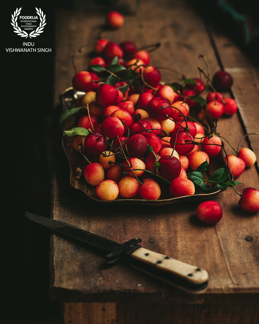 Shot in natural light, I wanted the feel of freshness and dew on the cherries. The interest here was the gradation of colors on the cherries itself, like a vintage cottage dream.