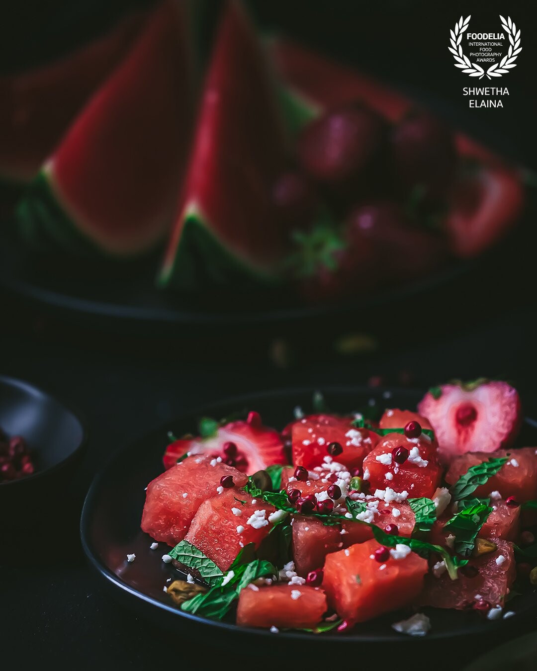 A humble salad with no added salt, no oil, no salad dressing, just fresh berries, water melon and some torn mint.  A few peppercorns for heat and some crumbled feta for saltiness.  Simple, refreshing and ready in a few, on a hot summer's day.