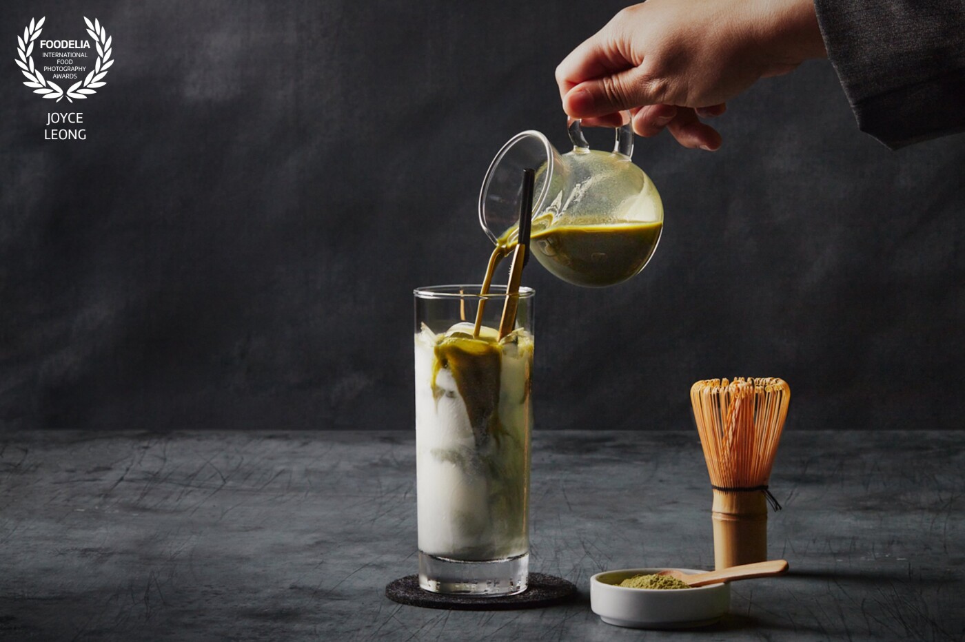 This was shot for a restaurant client who wanted a dark aesthetic and a pour shot was used to highlight the matcha as well as the swirls that appear when it mixes with the milk.