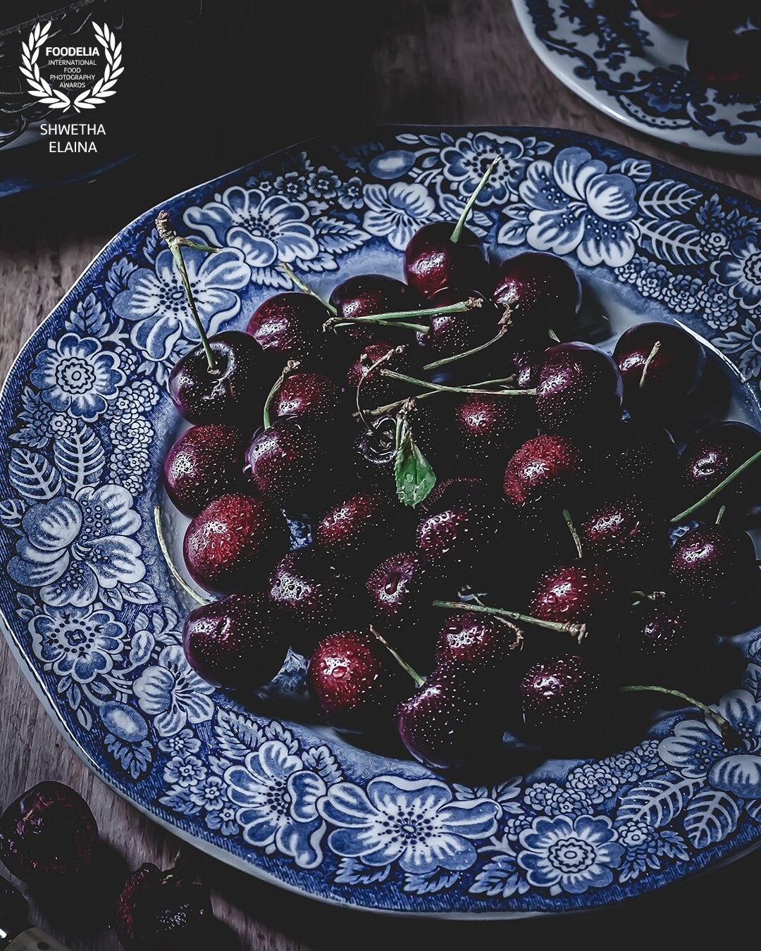 An attempt at learning color theory in food using these gorgeous sweet cherries washed under a kitchen sink faucet sprayer.  Learning to make intentional color choices in the composition of the scene, by following the color wheel.