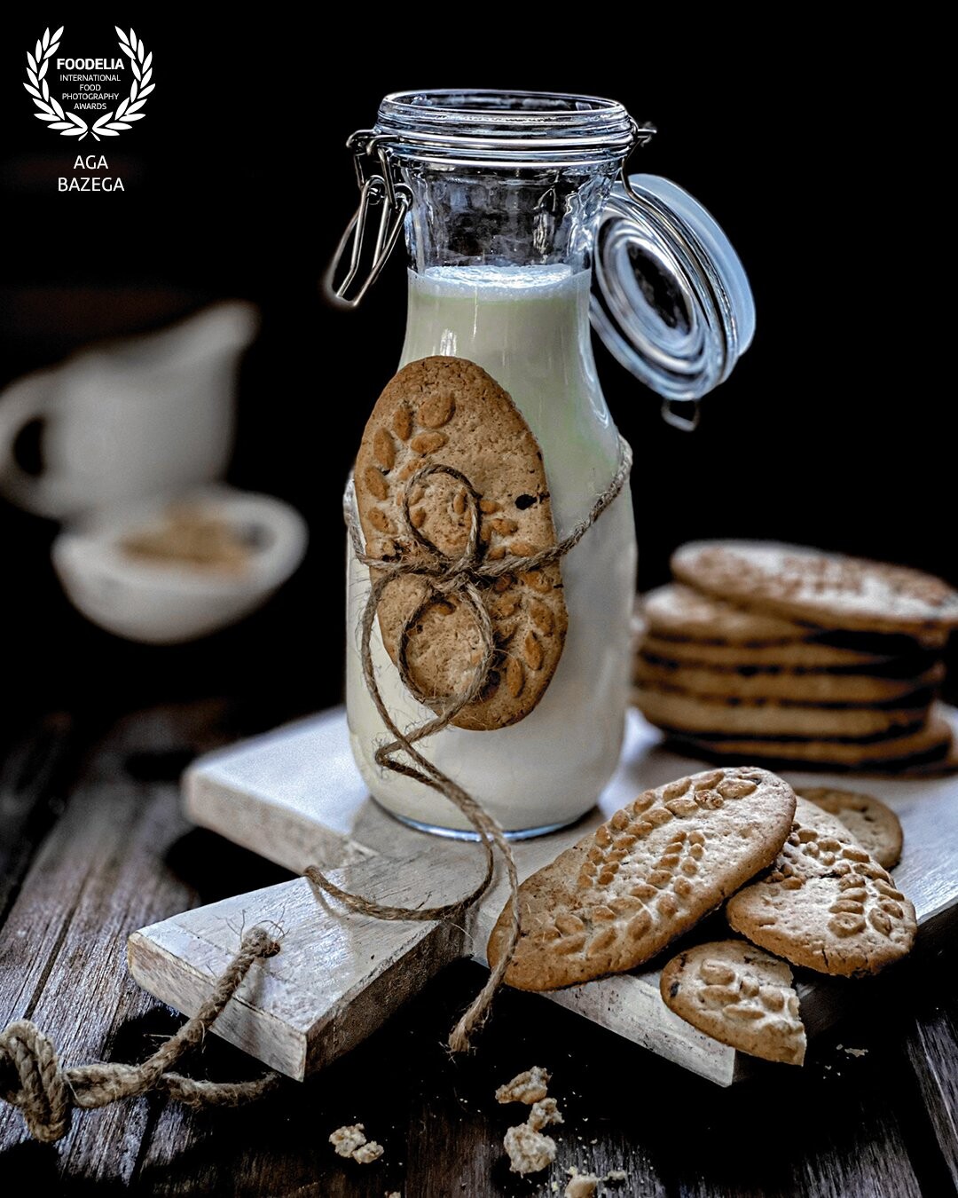 Old fashioned oatmeal cookies with goat milk. Image created for a photography challenge „Rustic and vintage”. Captured in my studio with a natural light.