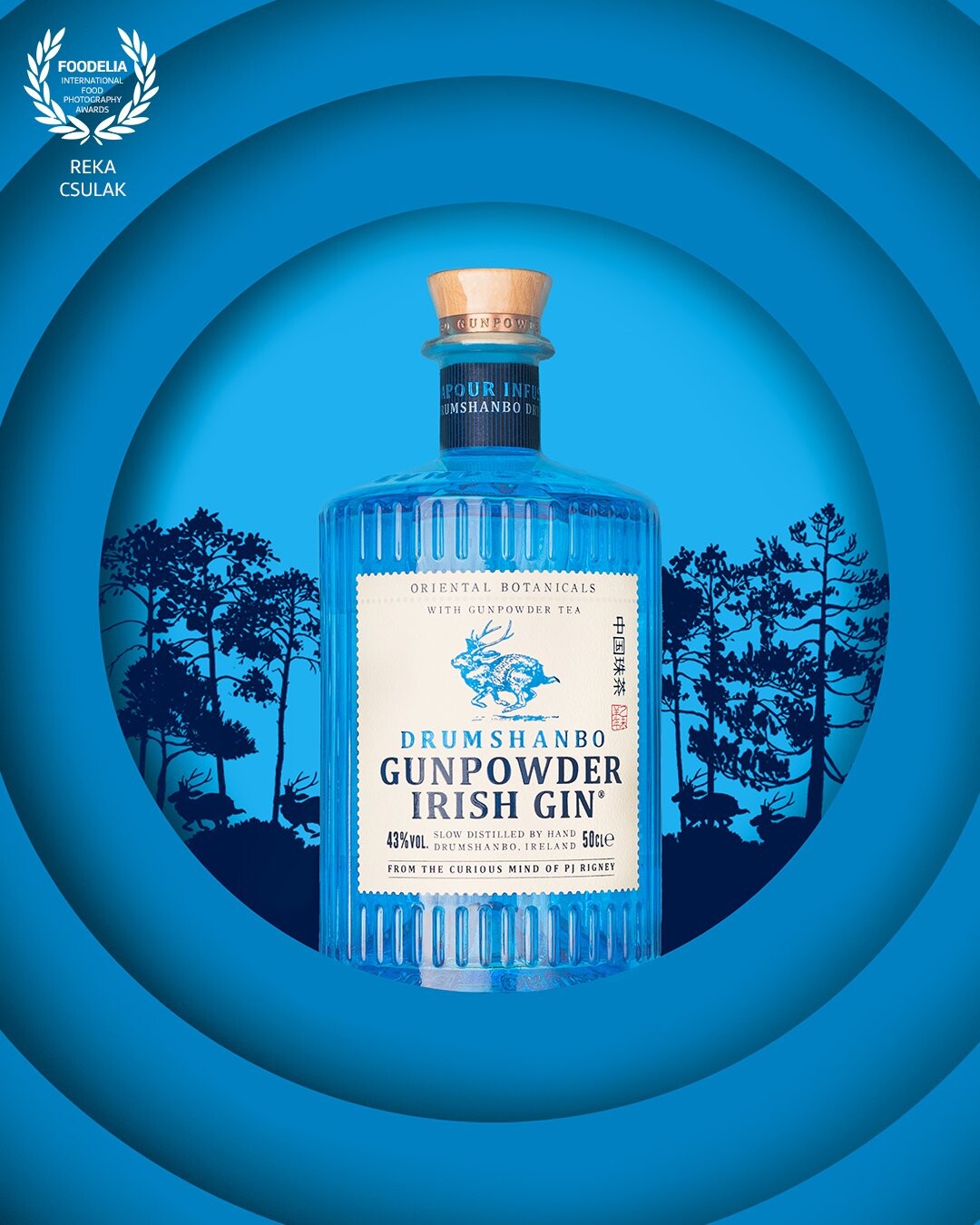 ⁠I shot the gin bottle in this cool environment of concentric circles and I took my sweet time to choose one of the endless options in product photography and post-processing, and the concept finally boiled down to this result so I executed my vision. ⁠I decided to utilise some illustrations to create the feeling of looking outside and seeing the silhouette of galloping deer in the forest.⁠