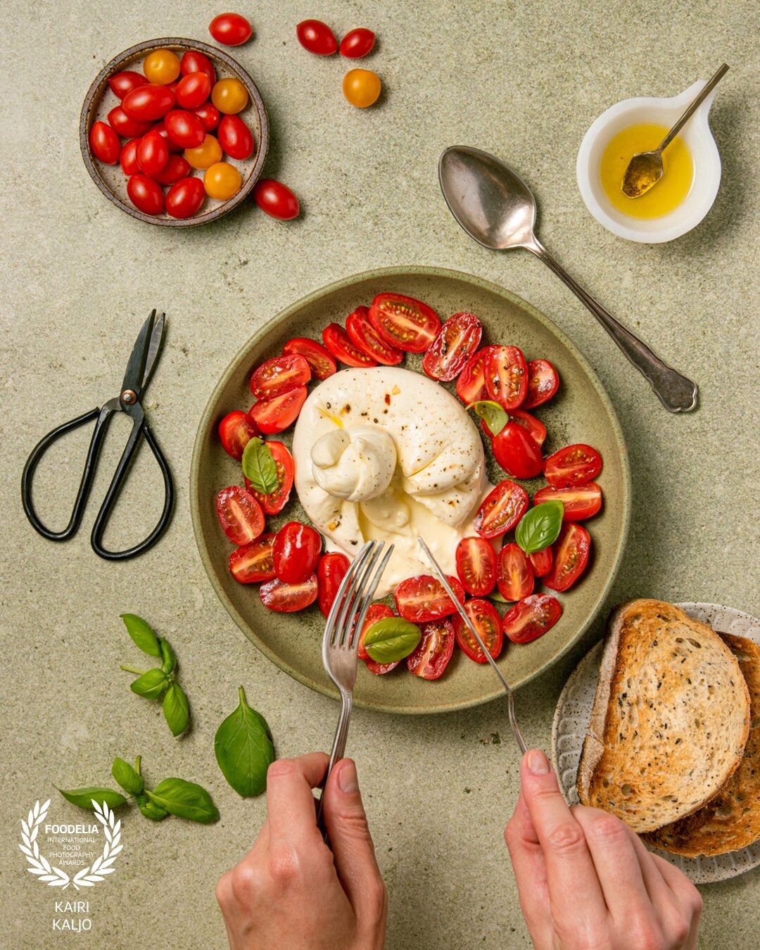 This photo was taken as part of the product styling session for a client featuring their Burrata cheese and showing off the surprise moment when you cut into it with fresh cream bursting out of it.