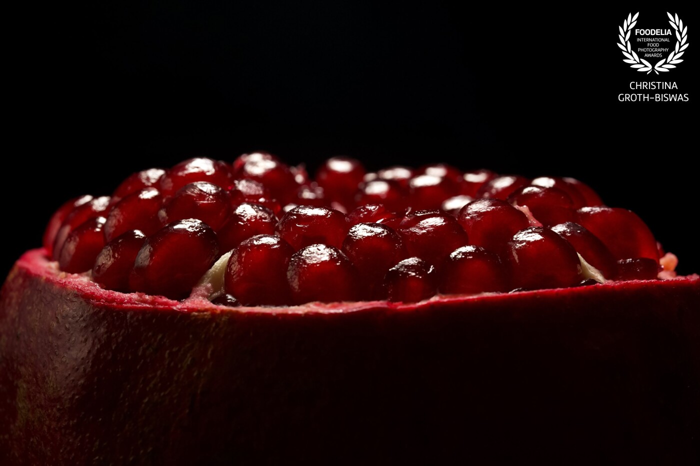 Macro image of a pomegranate. I've always had a similar image in my mind, but believe it or not until recently I didn't know<br />
how to properly peel a pomegranate. The picture was taken with only one artificial light source to create this dark and mystical atmosphere.