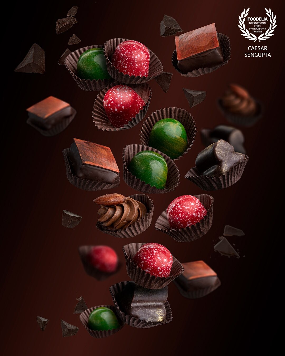 Chocolates are very interesting subjects for levitation photography. A dark and moody levitation image, where I would a create a sense of an explosion using a composite images with these chocolates.