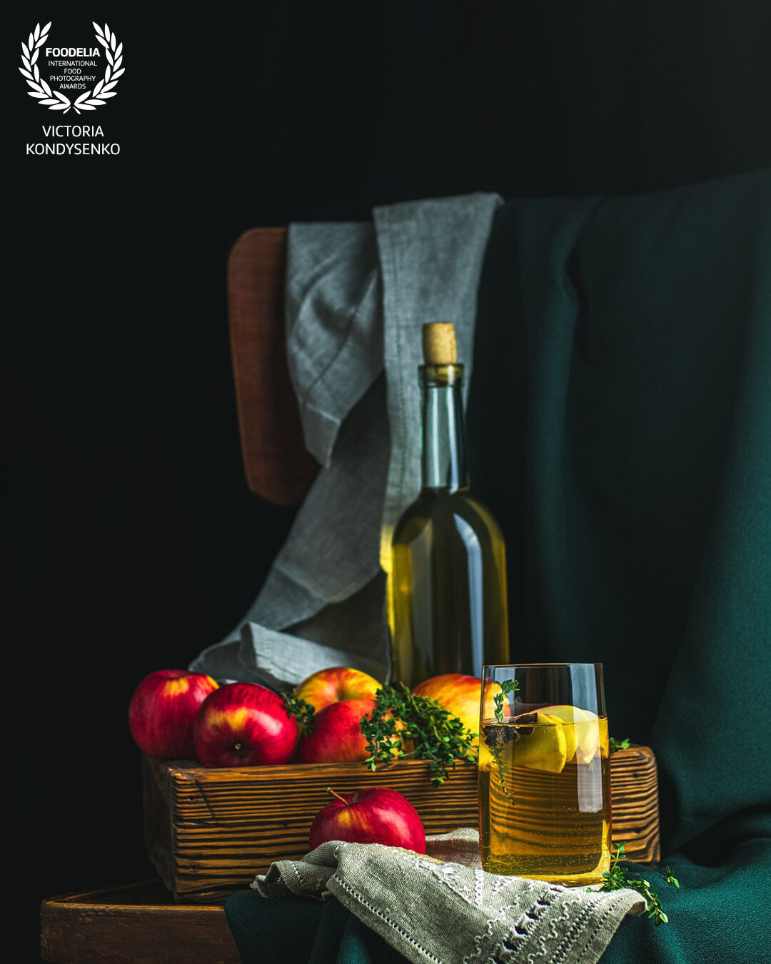 Advertising photo shoot of the local Ukrainian garden family farming . This Apple cider vinegar. Dark rustic style