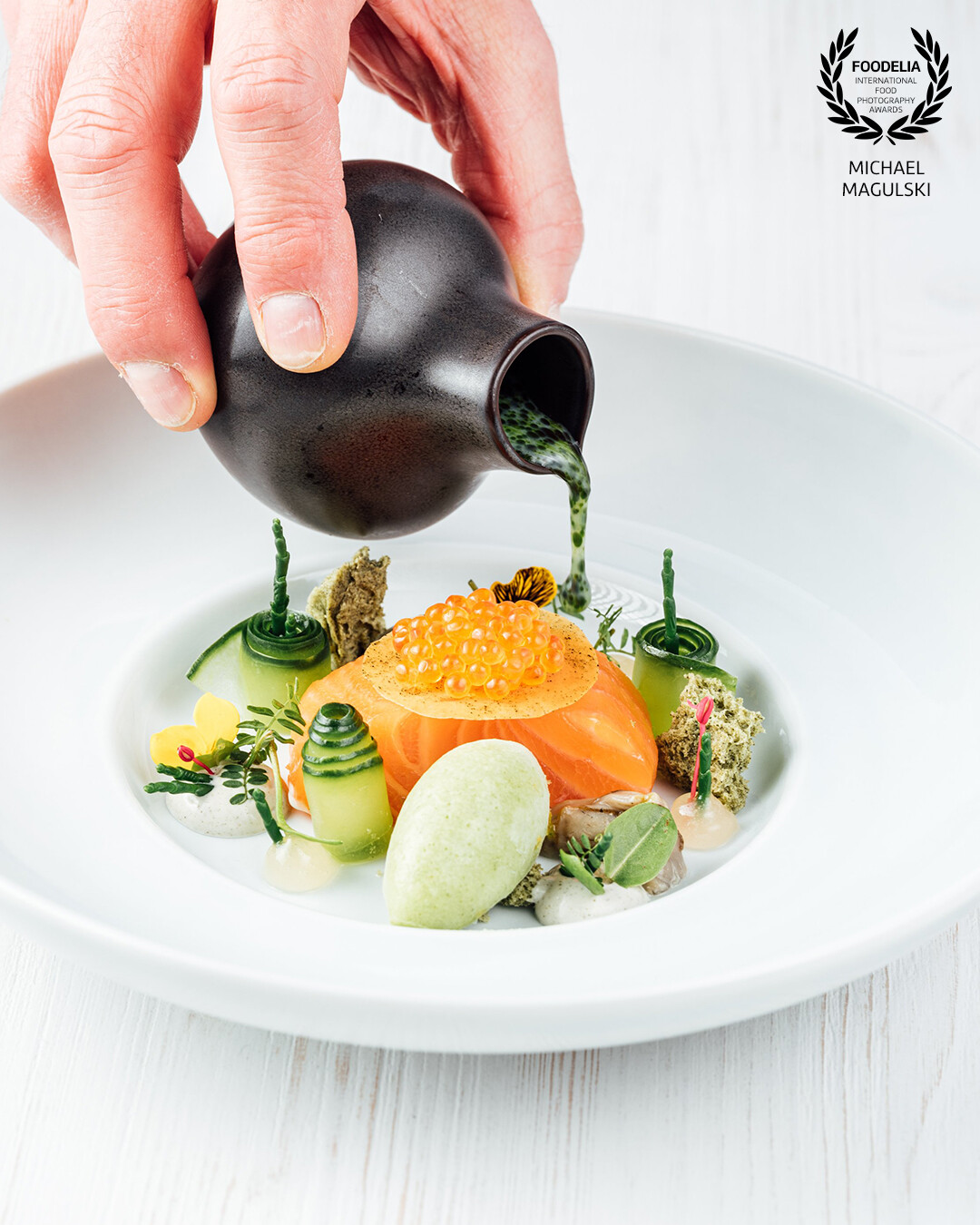 a very special dish, marinated salmon with cucumber and a touch of pistachio