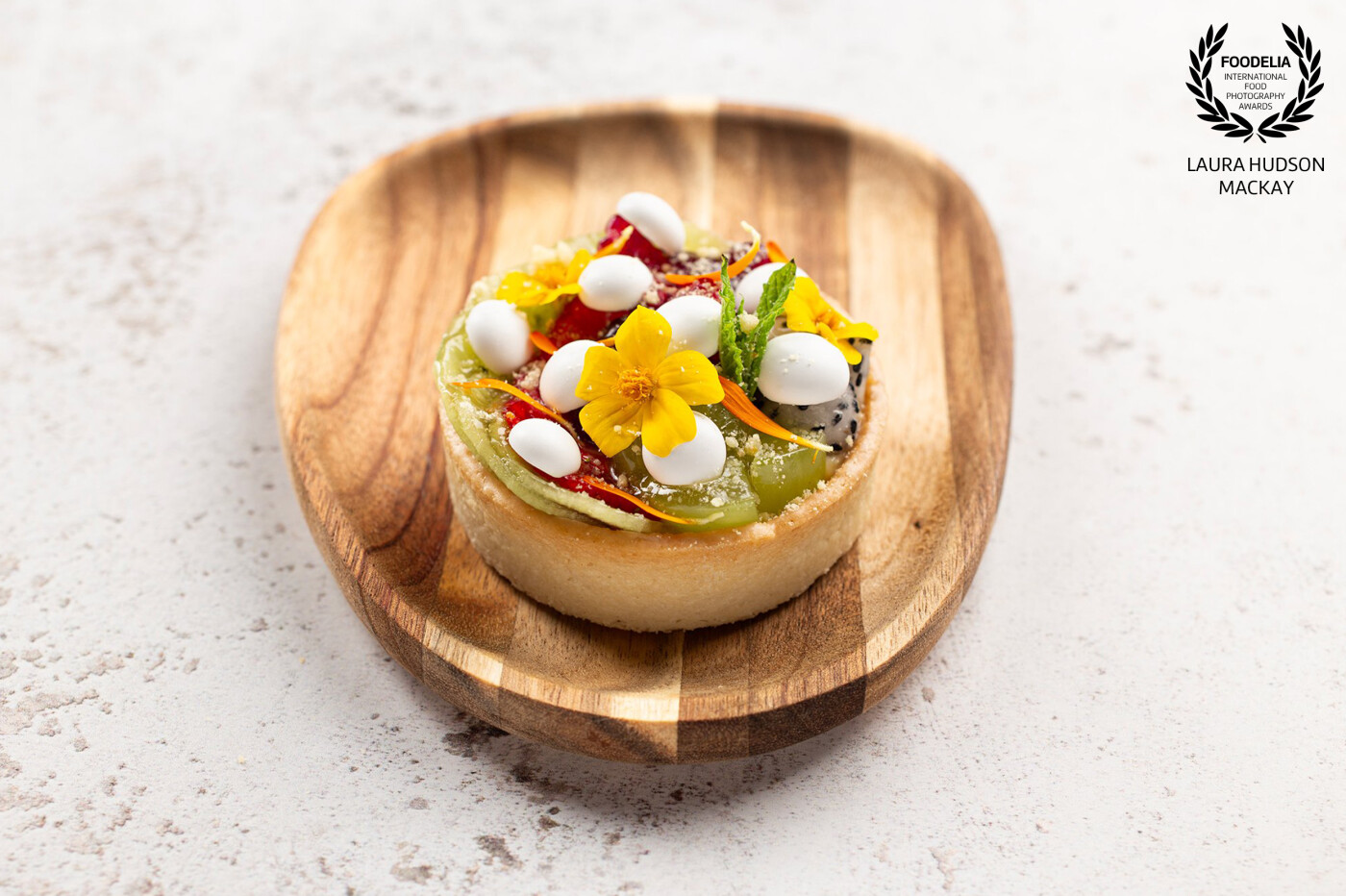 An exquisite fruit tart with meringue and tagete. Photographed at The Loft studio using artificial light. Totally incredible to collaborate, for a second time, with Scottish chef, Fraser Cameron.