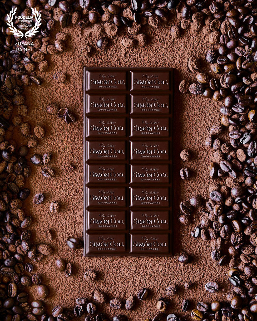 Simón Coll’s chocolate product images shot with natural light. The aim was to focus on high quality ingredients while still keeping the chocolate as the main hero. Ingredients such as cocoa powder and coffee beans were used to create the natural backdrop to support the chocolate’s quality. I shot the collection of three kinds of chocolate – coffee, orange and salt.