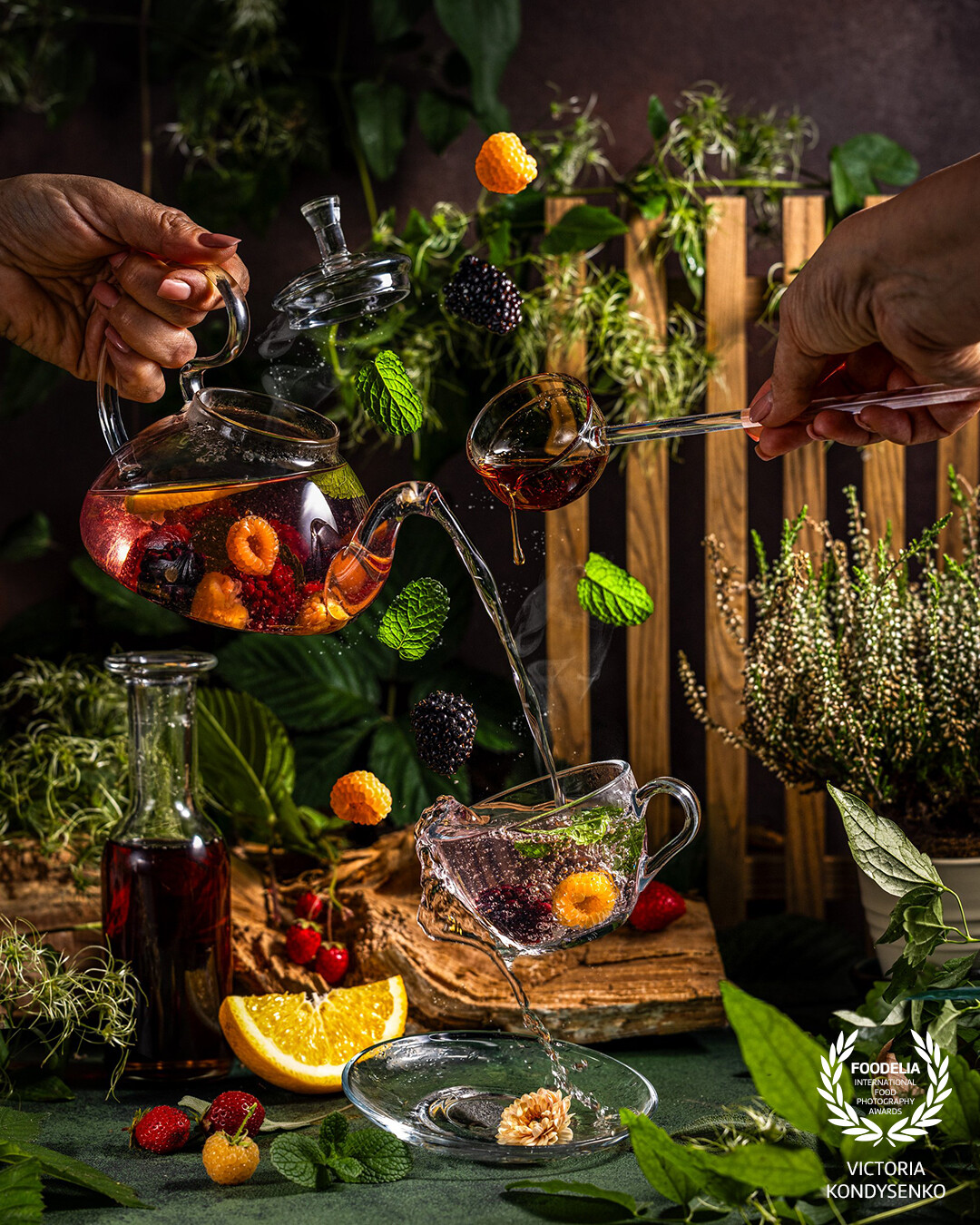 Berry tea with maple syrup. Advertising photo for the production of maple syrup,  local Ukrainian business.