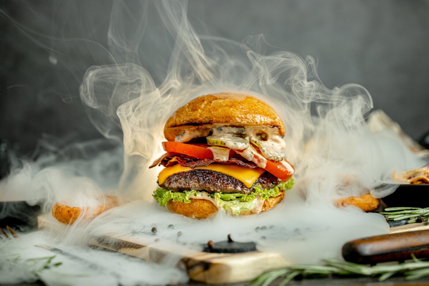 Black angus gourmet burger photographed for Muse Bistro. 

The burger is served  in a smoked spher...