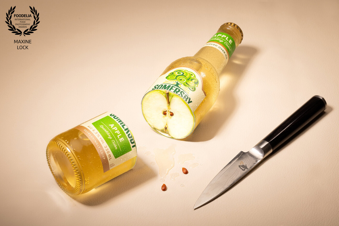An apple cider bottle "sliced" opened and ready to be served!