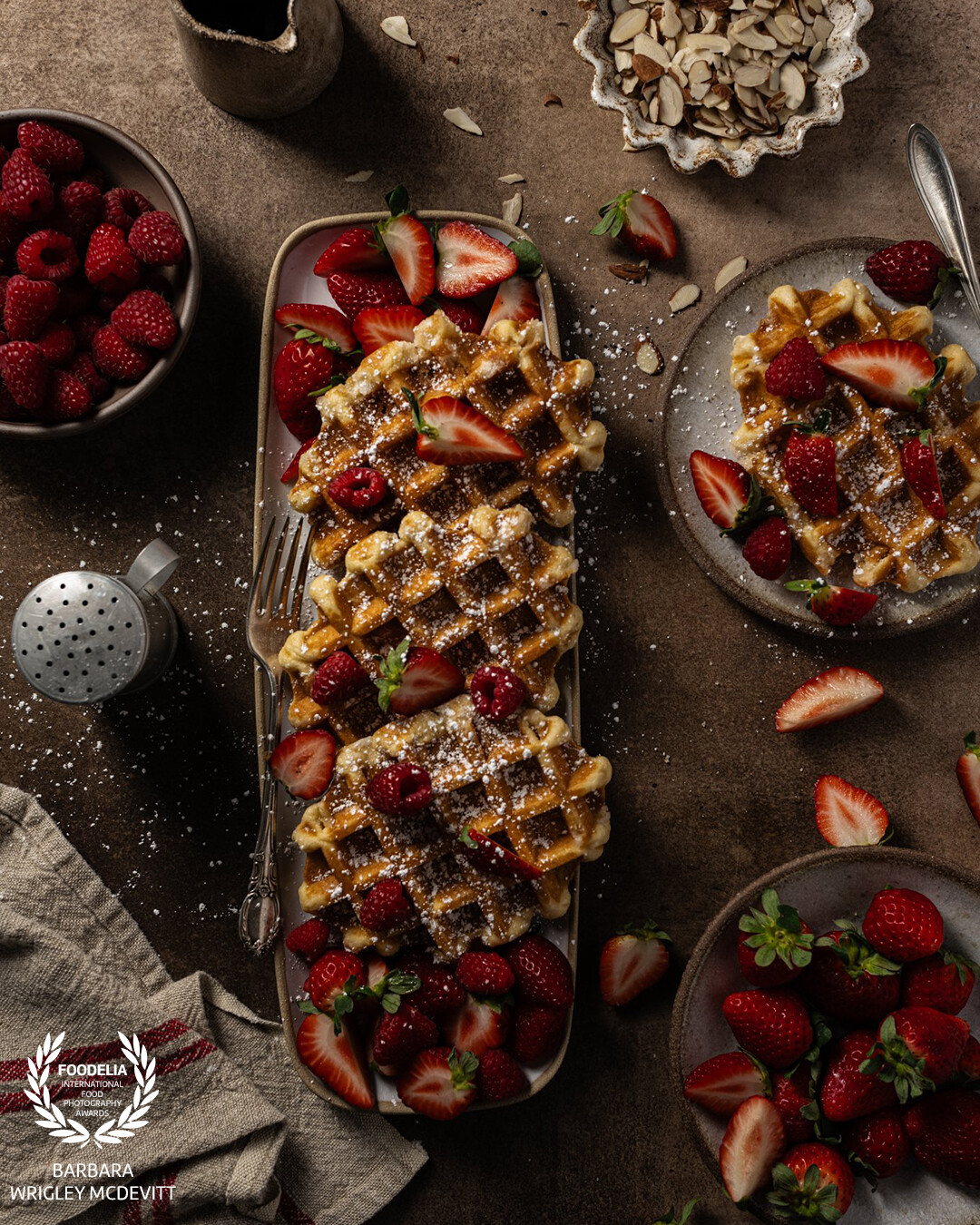 I wanted to do something a little festive for the holidays so I chose this Belgian Waffle, strawberry and raspberry composition on a brown background.  Shot with a Nikon z7ii, 24-120 lens at 40 mm, f/6.3, ss 125.  Profoto B10+ artificial light.  Edited in Lightroom.  After the shoot, all I had to do was serve and eat it!