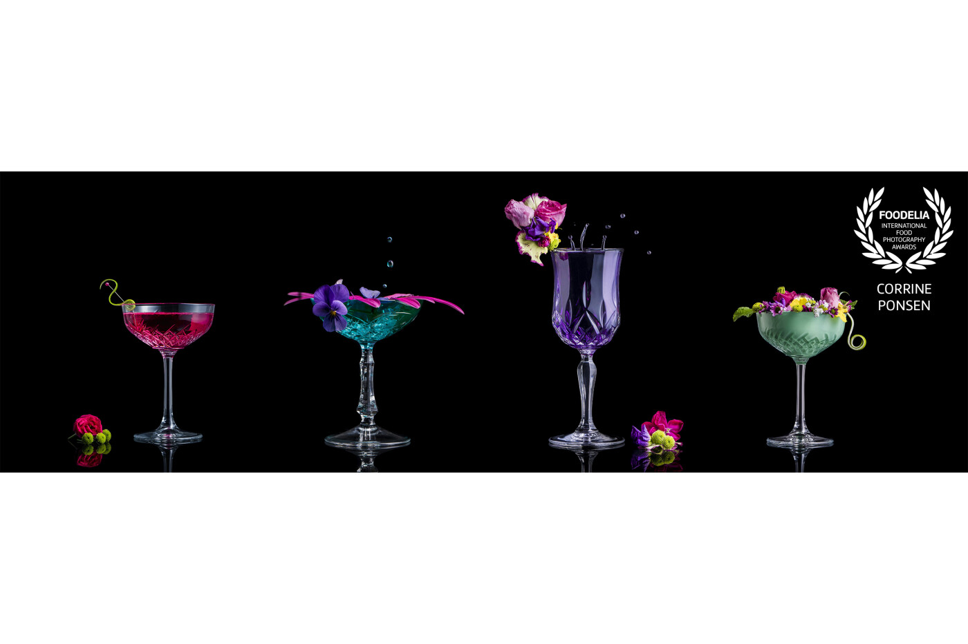 Colorfull cocktails blend together in 1 image. This is a composite of 4 pictures. Photographing at a black background en black reflecting surface. I made each picture with just 1 flash and bounce screen.