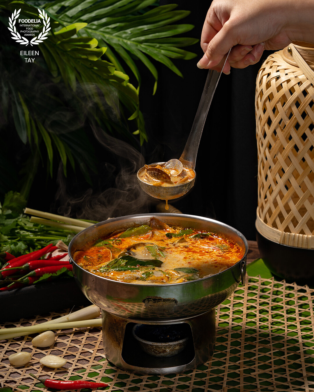 Shot this visual for a Thai restaurant in Malaysia.<br />
<br />
Tom Yum Goong is one of the most exquisite dishes of Thai cuisine. Thai cuisine is known for its rich and vibrant colors. Therefore, we used a variety of colorful ingredients like fresh herbs (cilantro, basil, mint), vegetables, and exotic spices to add visual appeal to the composition.