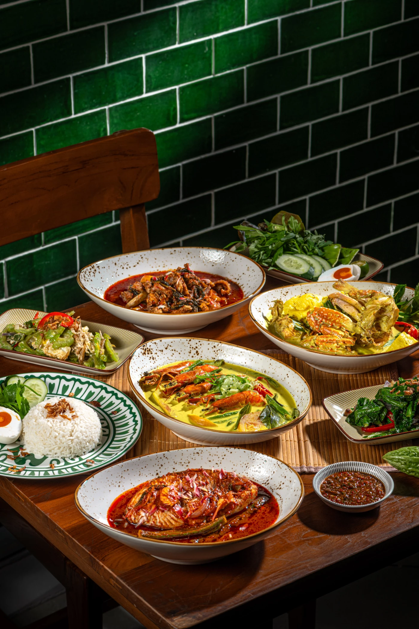 This image captures the vibrant essence of modern Malay cuisine, presenting an array of flavorful di...