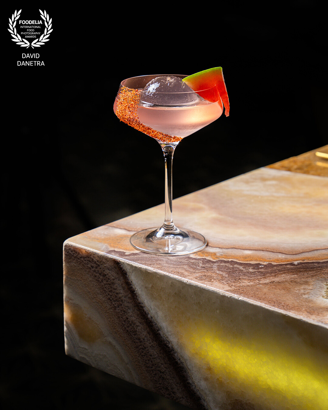 A vibrant cocktail in perfect light. 🍹✨ @mambolatinbog blends Tequila Patrón Reposado, fresh watermelon, orange liqueur, and a hint of lime. The image captures the bold colors and textures, evoking a perfect balance of freshness and character in every sip.