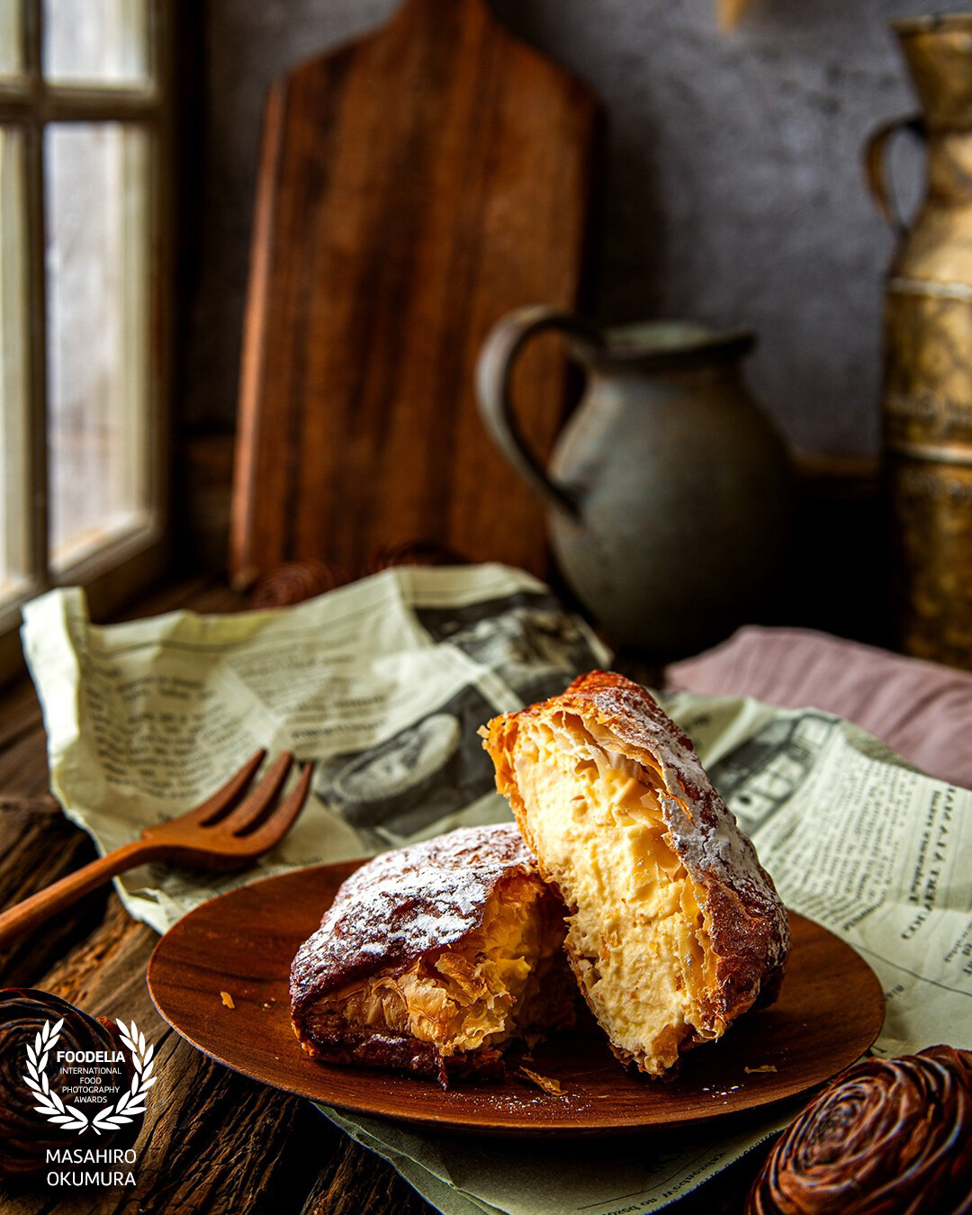 Outside the window, the cold sky is peeking in. Inside the room, the pie crust is cut in half for the two of us to share.