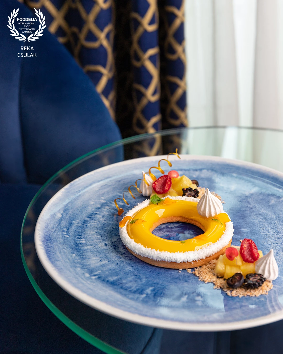 Shooting at an overseas location always adds something special, especially when the venue is a floating boutique hotel. This elegantly plated dessert, framed by the unique interior of one of the client's luxury suites, captures the essence of travel, taste, and thoughtful design. This became one of my favourite highlights from the project.