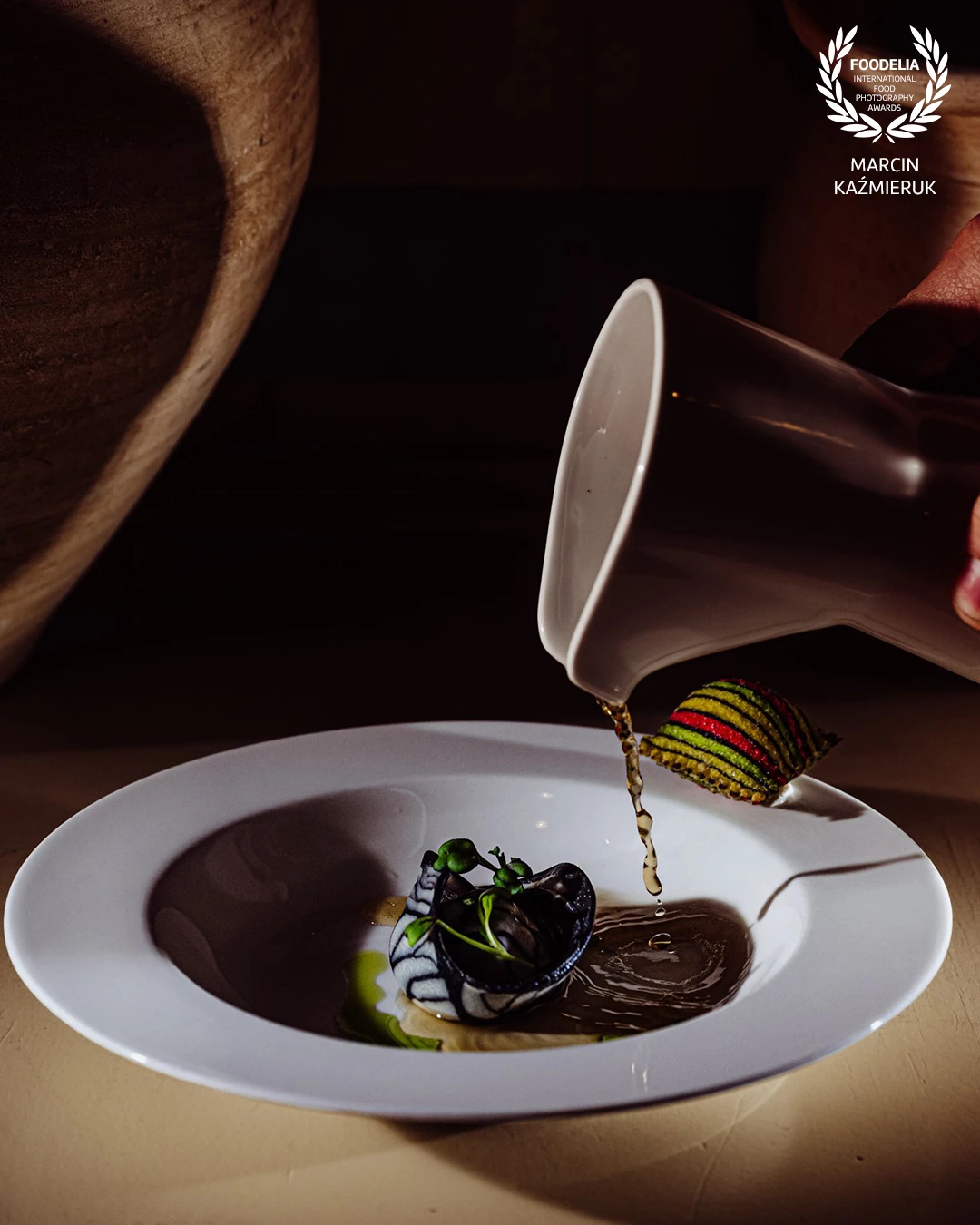 Festival of Flavors - Secrets of Polish Cuisine al Brunów Palace - Poland. Dish created by chef Miroslaw Jadach.<br />
<br />
Black and white tortelloni stuffed with wild birds (guinea fowl, pheasant, duck) served in wild bird broth, fried colorful pasta stuffed with smoked local goat and cow curd cheese.<br />
<br />
@marcin4funphotos<br />
@chef_jadach<br />
@fotofoodie<br />
@palacbrunow<br />
@nikon_pl @nikoneurope @nikonusa @godox_global