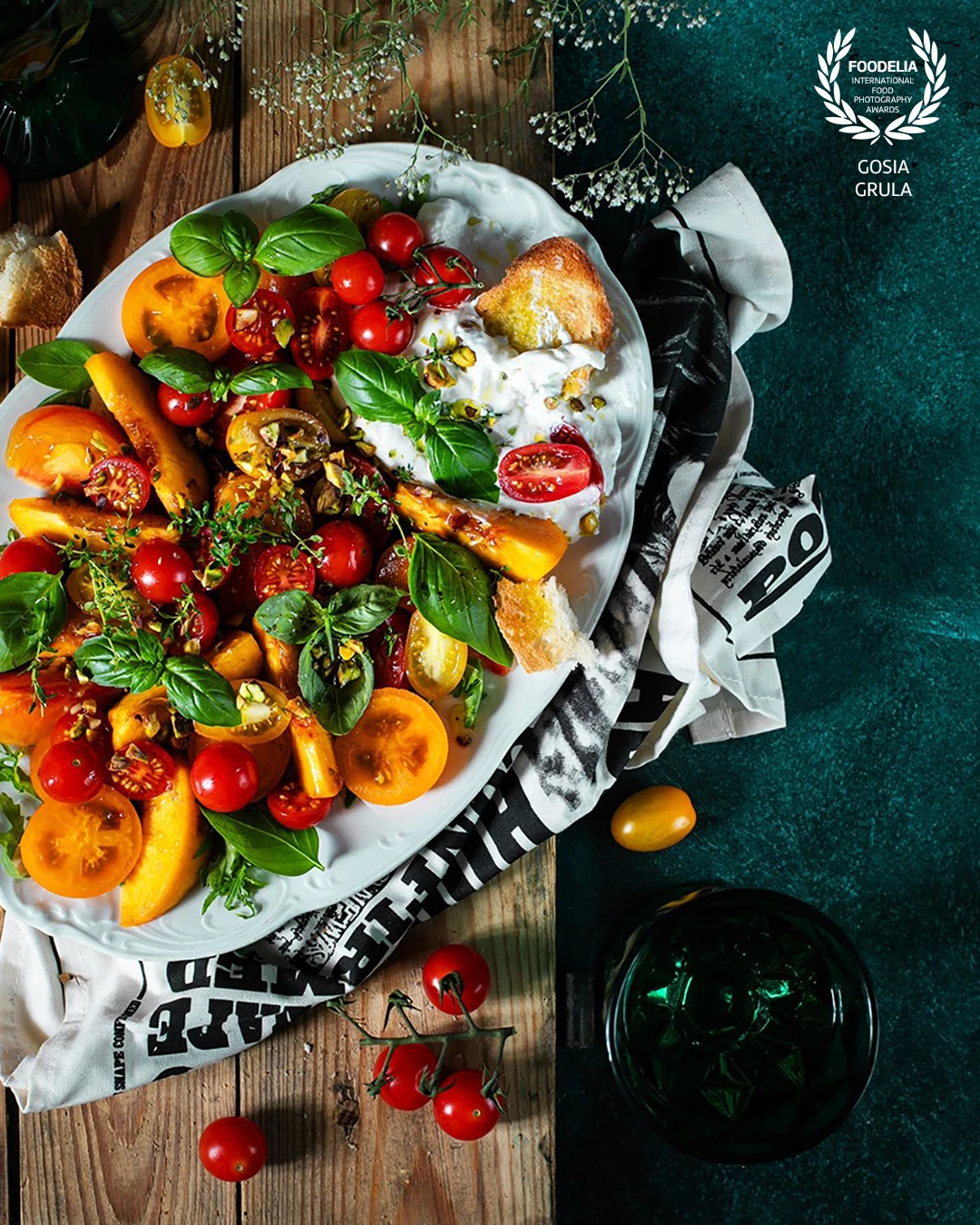 Suprisingly delicious combination of peach and tomatoes, accompanied by fresh herbs, burrata and pistachios. That's the taste of summer :)