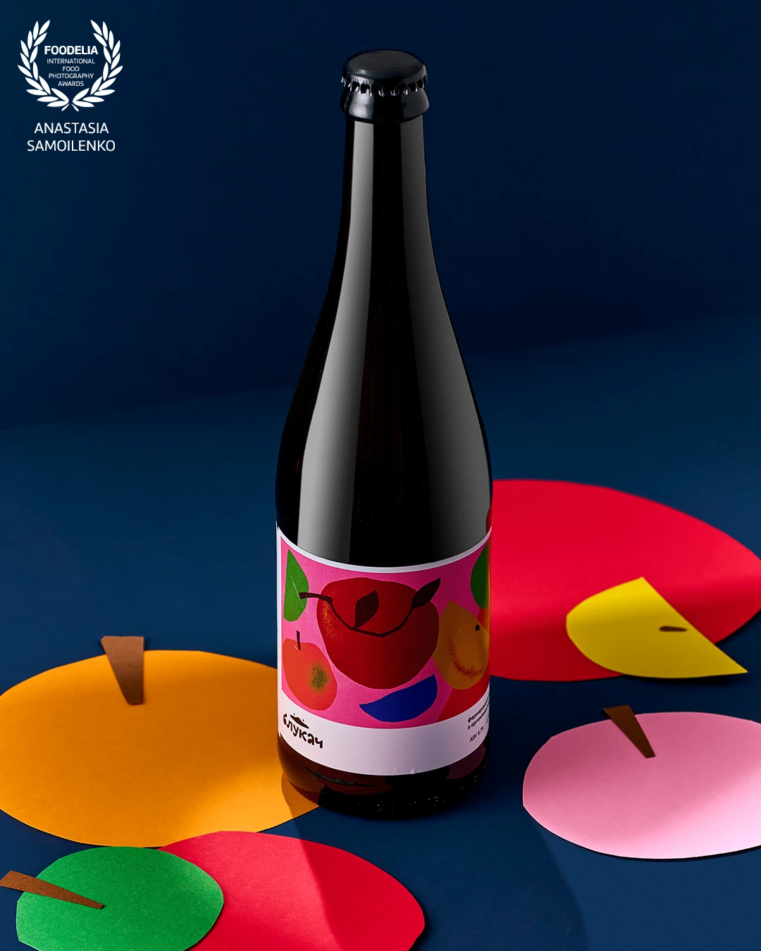 In this photo, I used elements from the label to create a prop. This created a unique background and highlighted the illustration from the label.