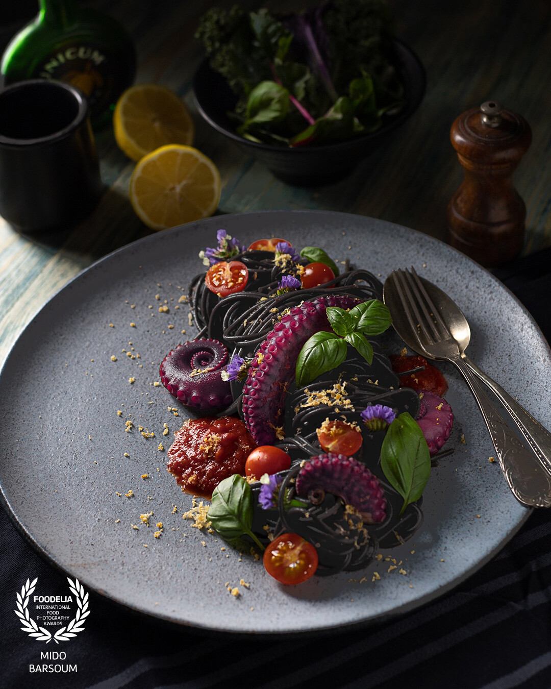 Something dark with lots of my favorite color combinations to match my very personal style. I've always wondered what color cooked octopus actually is. As one of my favorite animals, I know they can change color while they are alive, but as I was shooting this, I actually got confused several times. In the end, I went with purple when I was developing the photo. It just suits it so much! There was a lot of work to show the details and bring out the textures in the other ingredients and supporting elements as well. I hope you all appreciate this shot as much as I do.