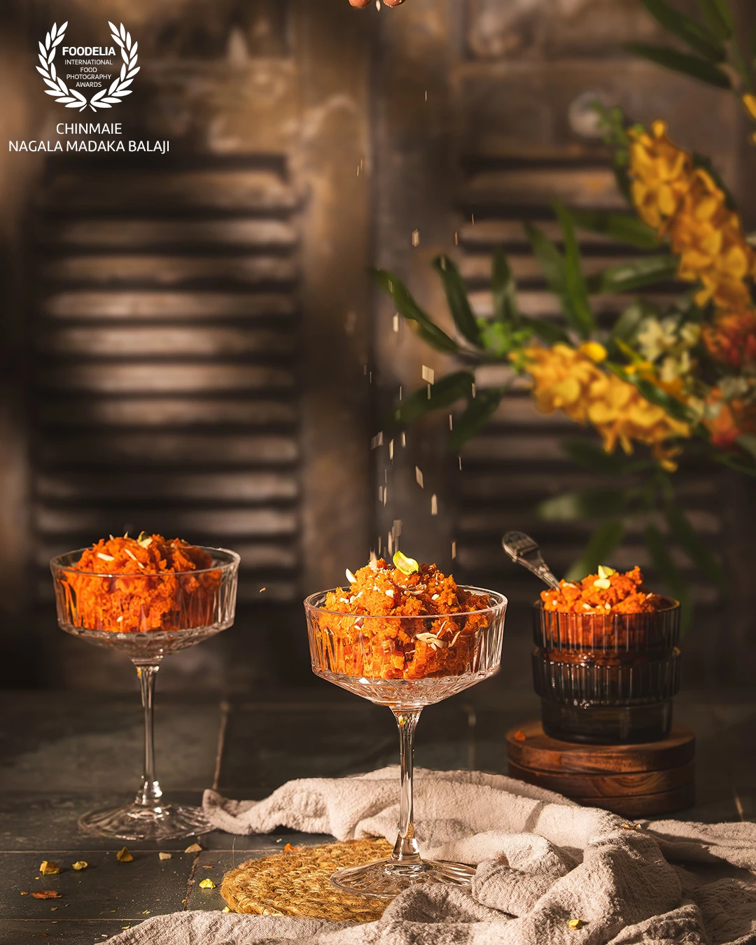Gajar Halwa - an Indian dessert. It embraces a cozy feeling of sitting with a family, sharing stories and indulging in this decadent halwa. A true celebration of comfort and tradition.