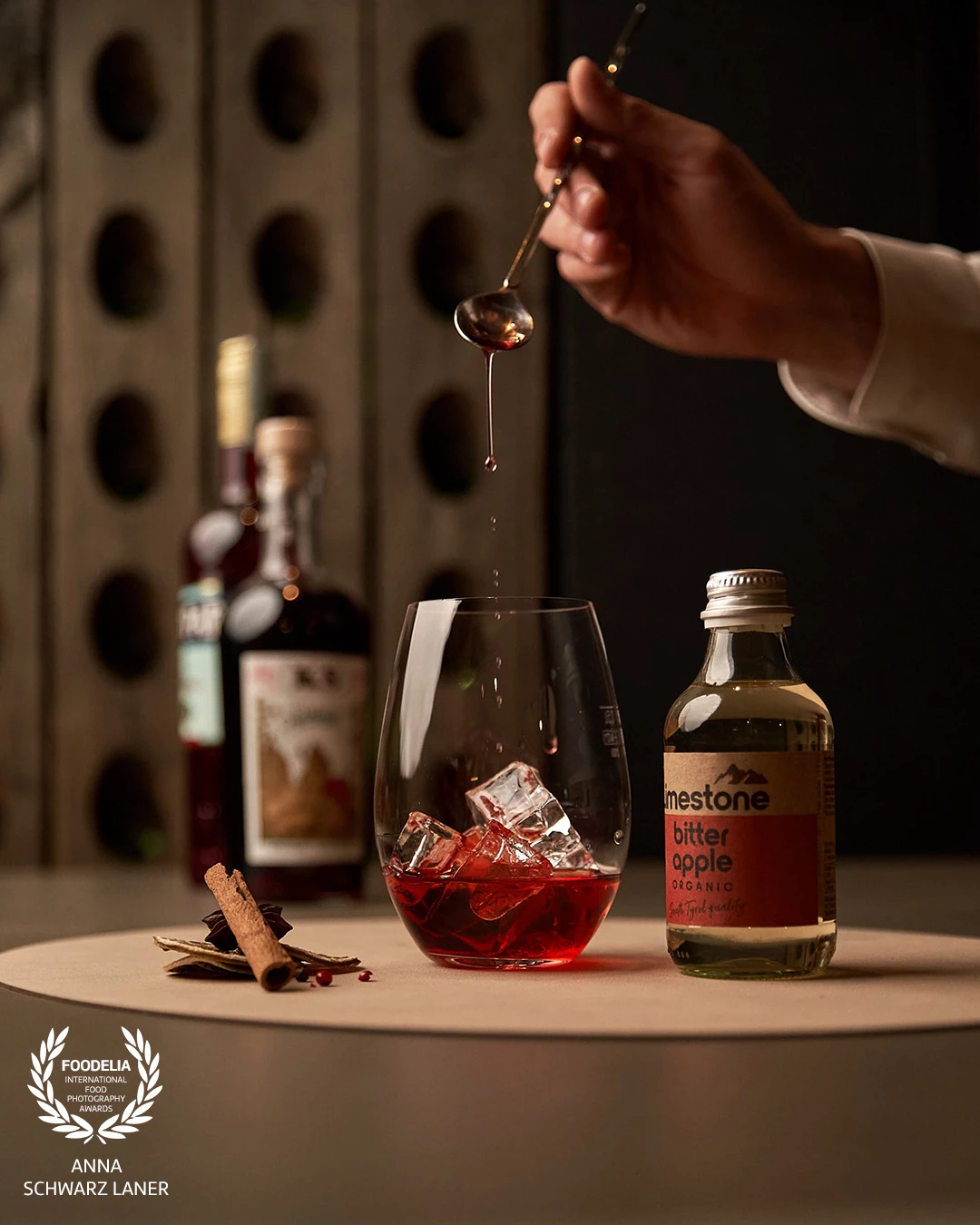 An exclusive creation from @gutshoflana, a restaurant known for its refined drinks, unique location, and elegant dishes.<br />
This shot was pure coincidence — a fleeting moment I caught while the bartender was preparing the drink. Not planned, just instinct and timing.<br />
The warm light, the composition, and the elegant atmosphere mirror the same exclusive feeling the restaurant itself conveys.