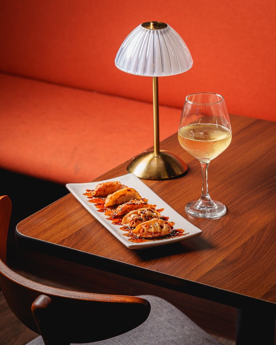 The lighting in this scene is soft and intentional, coming from a controlled, directional source tha...