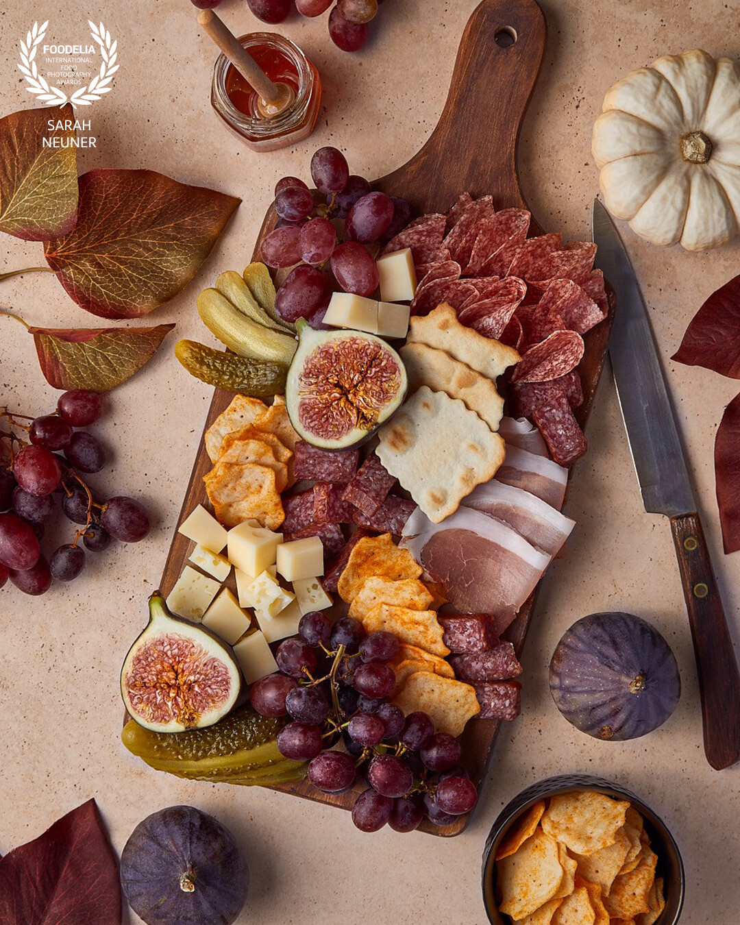 Autumn charcuterie board showcasing a selection of meats and cheeses from local producers in Tirol, Austria.