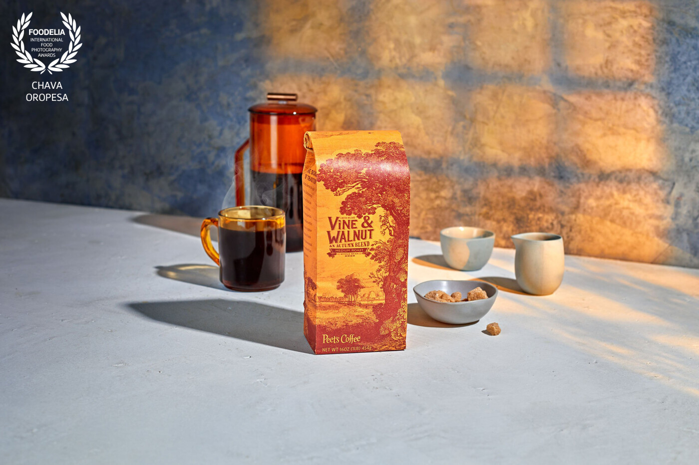 Client work for Peet's Coffee seasonal coffee.<br />
The Vine & Walnut's packaging has a great orange hue, so I thought framing it with blue and warm orange highlights would be a good solution to help the bag stand out.<br />
Food styling: Lorena Masso