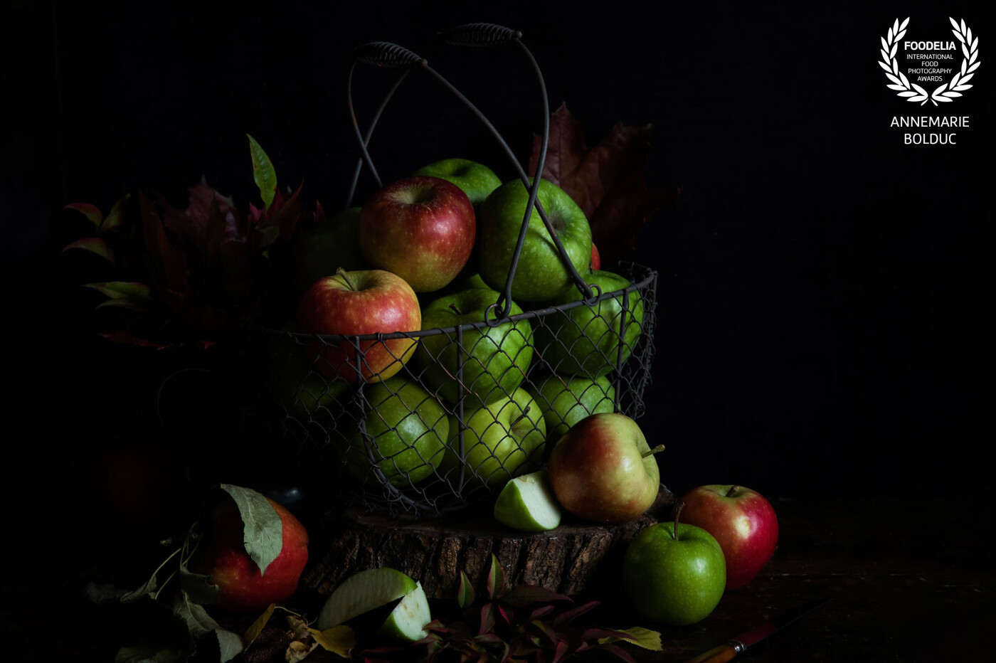 A basket of fresh apples straight from the orchard, in "clair-osbcure". The bushfire that devastated this apple-growing region revealed the true colours of many things through the darkness. This one is for Batlow.