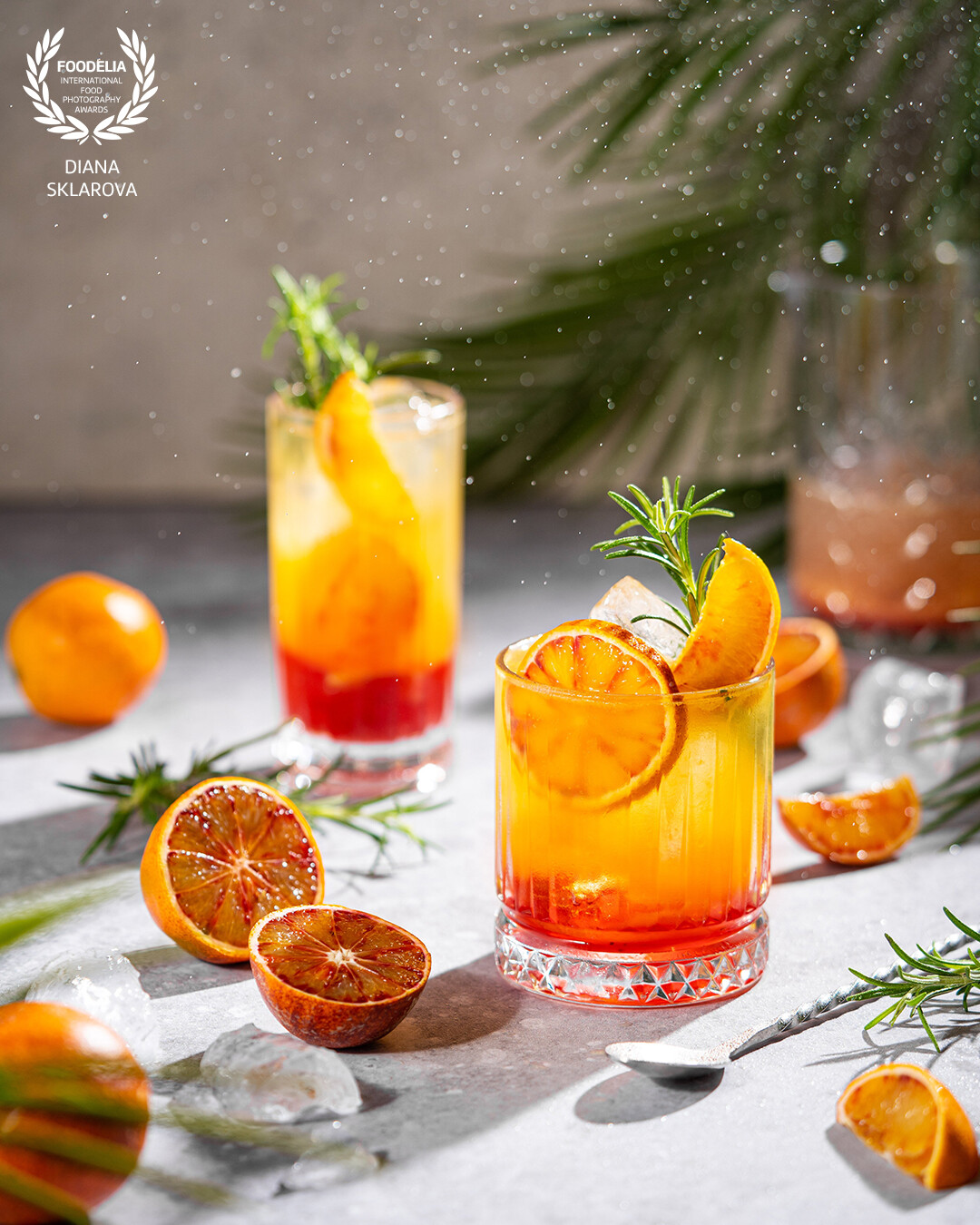Red orange cocktail drink in sunny summer mood.