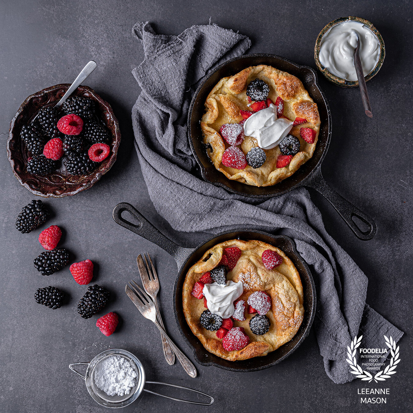 Delicious Dutch Baby Pancakes with Fresh Berries and Yoghurt.  This is an overhead composition using the Golden Ratio, Phi Grid and the S Curve.  It is always difficult to guage just how much fill light is enough until you see it.